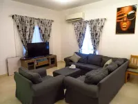 Spacious 5-bedroom villa Near the Beach,Close to airport with WiFi, AC in Muscat