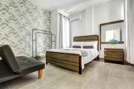 Charming Getaway Villa Отели рядом с достопримечательностью «Манхэттенский колледж»