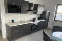 Spacious apartment in a central location directly on the river Niers and park