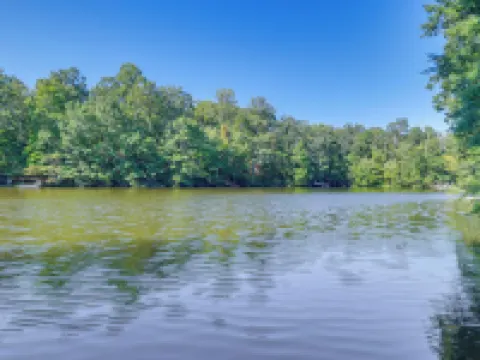 Lakefront Log Cabin Retreat w/ Hot Tub + Kayaks! Hotels in Calvert County