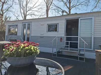 Cozy, mobile home Banjer at camping de Tien Heugten in Schoonloo Các khách sạn ở 