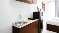 Serene and Comfy Studio at Tamansari Prospero Sidoarjo Apartment By Travelio