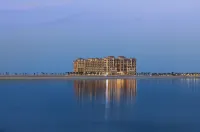 Pullman Resort Al Marjan Island Hoteles en Bab Al Bahr