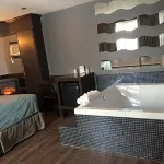 Olux Hotel-Motel-Suites - baignoire