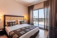 Kfar Maccabiah Business & Sport Hotel Отели в г. Ezor Ramat Gan