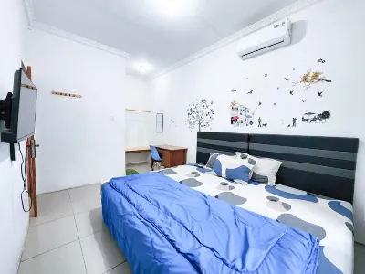 Homey Guesthouse Kertajaya (Syariah) Hotels in Pucang Sewu