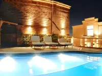 La Mision Hotel Boutique - مسبح على السطح