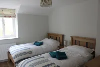 Gorgeous Lakeland cottage with delightful private garden. Free EV charging.