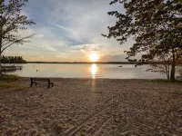 Beautiful home with 150ft sandy beach and private boat launch on Big Sebago!!!!!
