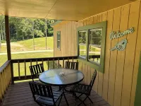 Peaceful Hills Retreat’s cottage is clean and cozy with a creek on 97 acres