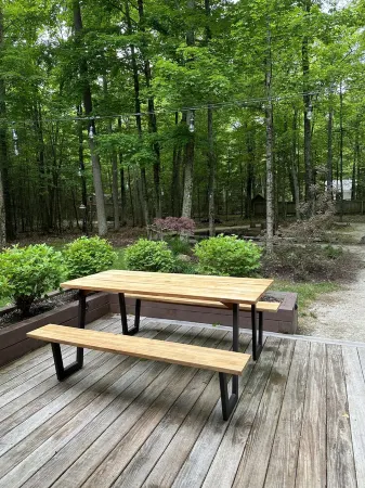 Cozy cottage tucked in the woods. 5 minutes from Cave Point and Whitefish Dunes.