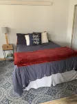 Little Den is an efficiency, cabin located on the Big Laramie River.