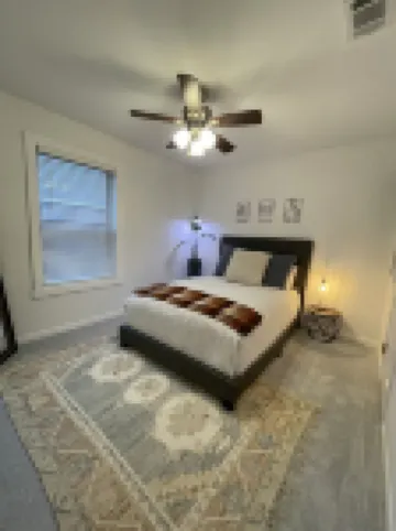 Cozy and cheerful three bedroom home with hot tub.