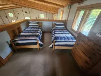 Cozy lodge with indoor pool, hot tub, loft and more! Great for a close getaway!