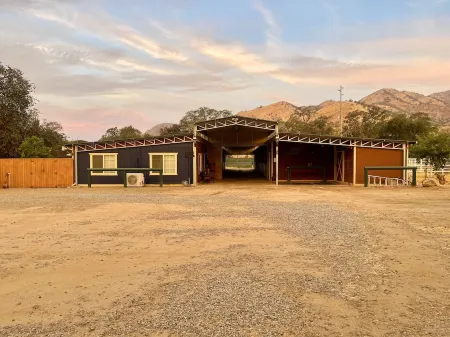 Our Cowboys Hideout is on a working horse ranch with spectacular mountain views!