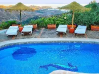 Stylish Andalusian country house with pool in olive grove facing the sea - Bungalows