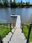 On the Chain, near downtown, close to trails, private dock, dog-approved! 🌊 🌞 🐶