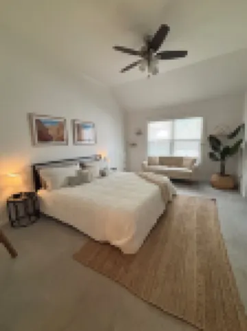 Cozy and cheerful three bedroom home with hot tub.