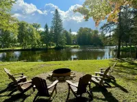 River Pines~Downtown Waterfront w/ Wildlife Watching!Firepit,Snowmobile,Biking