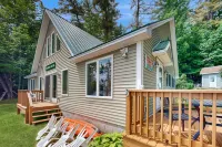Charming lakefront home with water views, dock & inviting deck