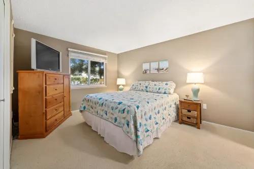 Charming Condo with Private Deck and Gated Parking - Serene Coastal Retreat