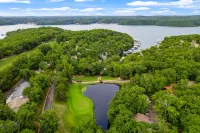 Serene waterfront condo with W/D, patio, & electric grill - boat slip on lake Hotels in Lake Ozark