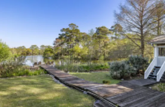 Private Dock and Serene Lagoon Views - Stunning Coastal Retreat