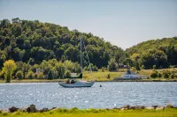Open Concept with Modern Kitchen and Parking - Charming Studio Hotels in Traverse City