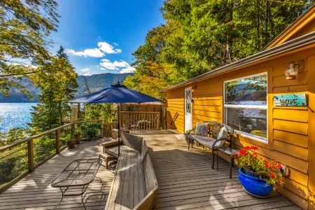 Private Dock and Spacious Deck by Tranquil Lake - Charming Escape