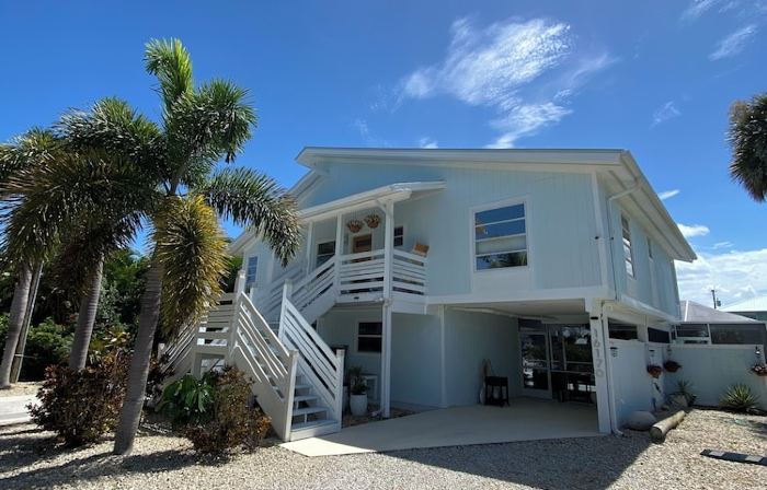 Antigua Cay Retreat is a stylish home with pool on deep water canal in Bokeelia