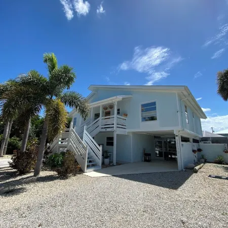Antigua Cay Retreat is a stylish home with pool on deep water canal in Bokeelia