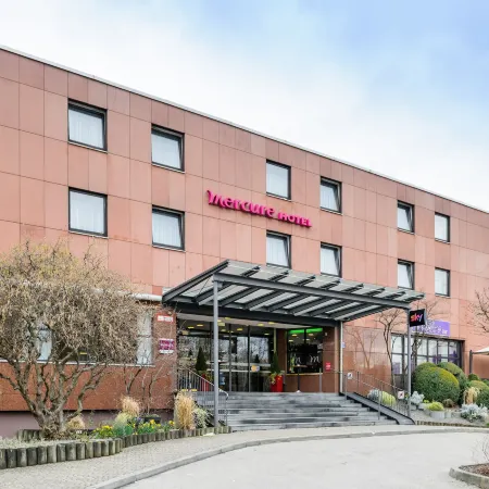 Mercure Hotel Muenchen Sued Messe Отели рядом с достопримечательностью «Станция метро Quiddestr.»