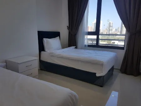 Magic Suite Boulevard Salmiya Отели в г. Al-Bidea