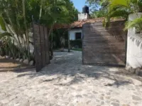 An exclusive jungle hideaway just steps from Plaza and the beach