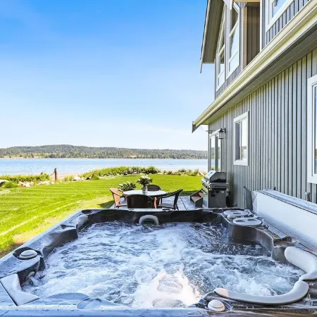 Open Design West Coast Home on 1600 Feet of Private Waterfront