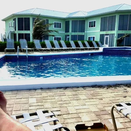 Beachfront Peace!  Awesome top floor condo on Caribbean plus military discount!