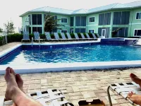 Beachfront Peace!  Awesome top floor condo on Caribbean plus military discount!