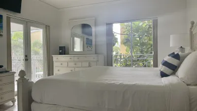 Magnificent Ocean Views in the Heart of 7 Mile Beach !! Fully Stocked !