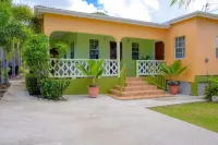 Two bedroom, 2 bathroom house in a tropical palm and garden setting.