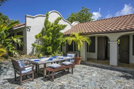 Amazing sunset, ocean front, open air villa w/path to sea and dock