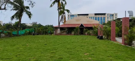 OMR Grand Inn Отели в г. Келамбаккэм