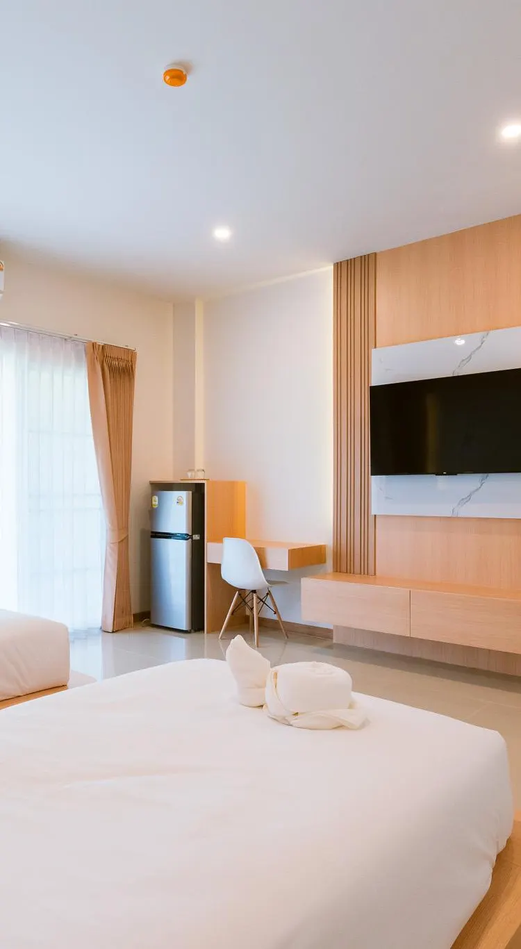 ห้องดีลักซ์ เตียงแฝด พร้อมระเบียง