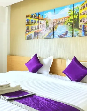 ห้องดีลักซ์ เตียงใหญ่ 1 เตียง