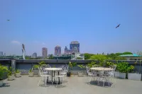 Olive Zip Richmond Circle by Embassy Group
