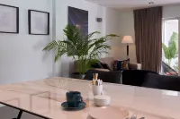 Modern apartment with private terrace and swimming pool