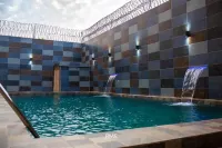 Appartement de Haut Standing Climatisé Proche de Toute Commodité Hôtels à : 