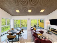 Luxurious 4-room penthouse with jacuzzi, roof terrace, parking space, e-charging station Hotel a Wachtberg