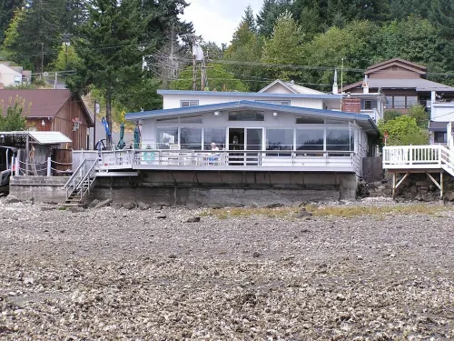 Water front, private beach, steps from down town Hoodsport with lots of parking.