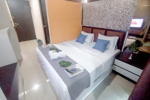 Modern and Tiny Studio at Tamansari Papilio Apartment By Travelio