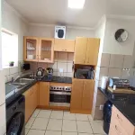 Secure 2-Bedroom Apartment with Pool View in Mossel Bay - Apartments